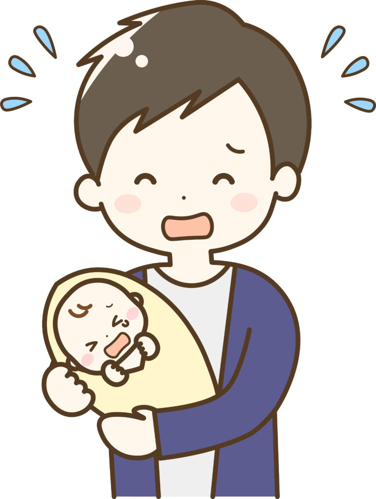 赤ちゃんを抱っこするパパ